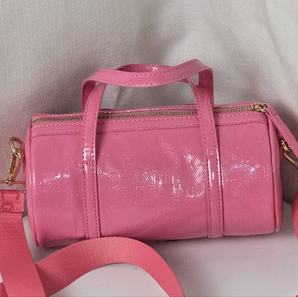 Pink Crossbody Bag with Glossy Finish and Adjustable Strap